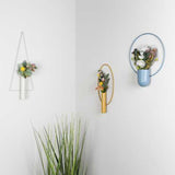 Stratton Home Decor Blue Round Wall Planter